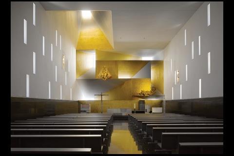 The “fanlights” behind the buiding’s altar create the impression of a cubist painting
